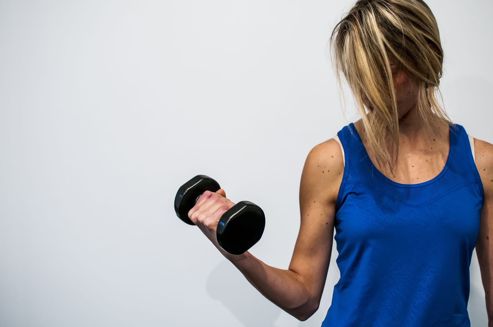 young girl making abdominal, stretching and weight for arms for fitness